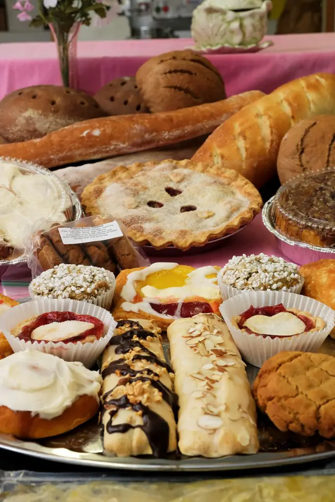A table filled with lots of different types of pastries.